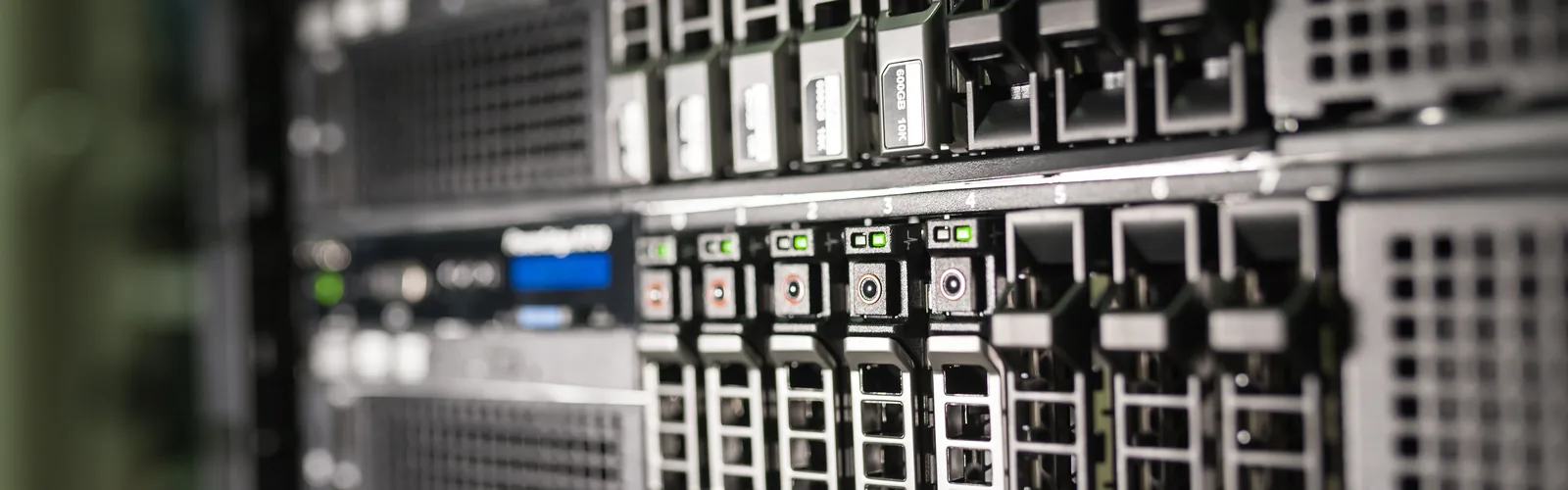 Server rack drive bays showing RAID 5 hard drives during a failure diagnosis